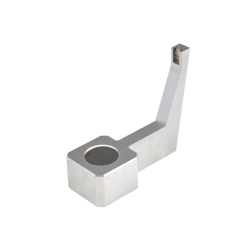 L-shaped precision machined metal component with a circular opening and an angled upright arm